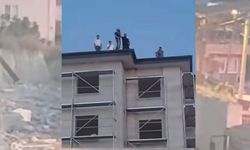 İşçiler inşaatın çatısına çıkarak eylem yaptı!