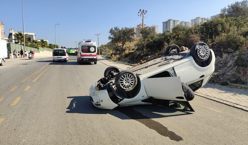 Kuşadası’nda takla atıp, ters dönen otomobildeki sürücü yaralandı