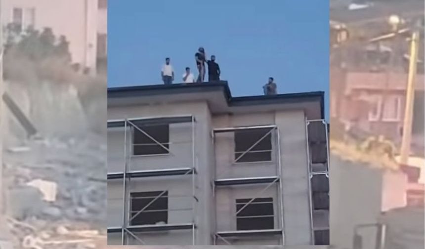 İşçiler inşaatın çatısına çıkarak eylem yaptı!